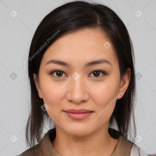 Joyful latino young-adult female with medium  brown hair and brown eyes