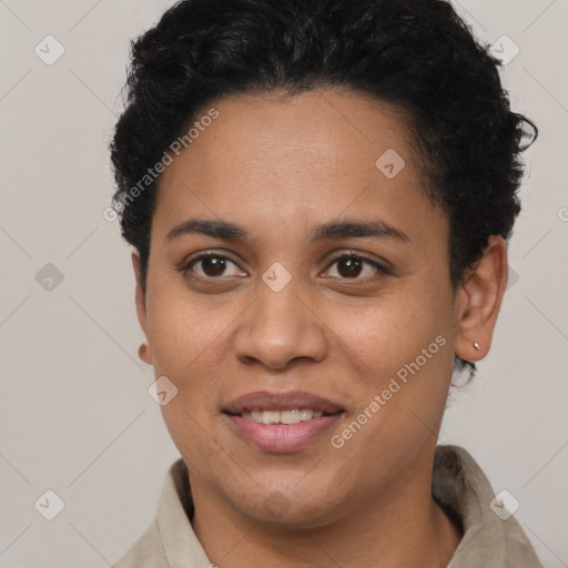 Joyful latino young-adult female with short  black hair and brown eyes