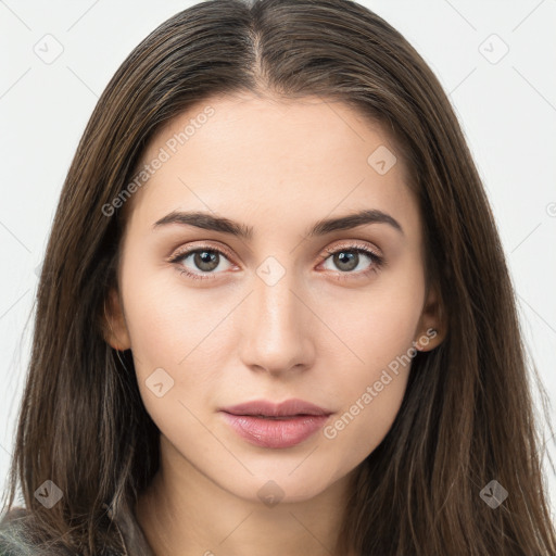 Neutral white young-adult female with long  brown hair and brown eyes