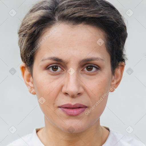 Joyful white adult female with short  brown hair and brown eyes