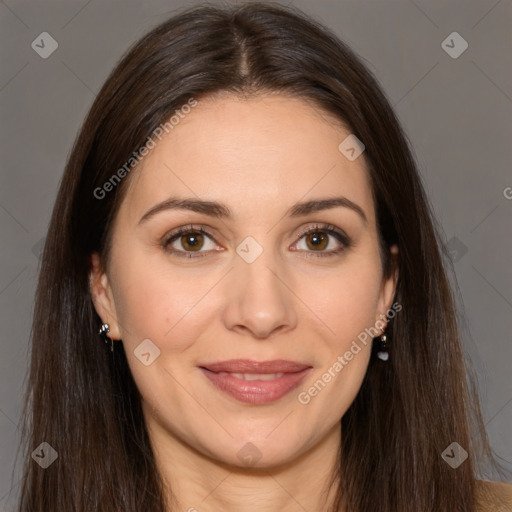 Joyful white adult female with long  brown hair and brown eyes