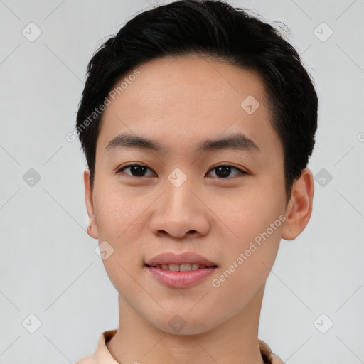 Joyful asian young-adult male with short  black hair and brown eyes