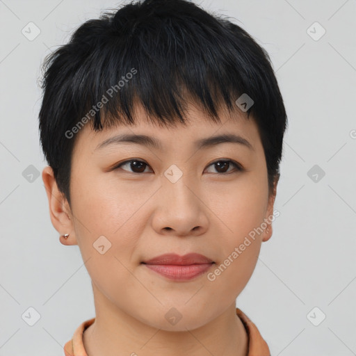 Joyful asian young-adult female with short  brown hair and brown eyes