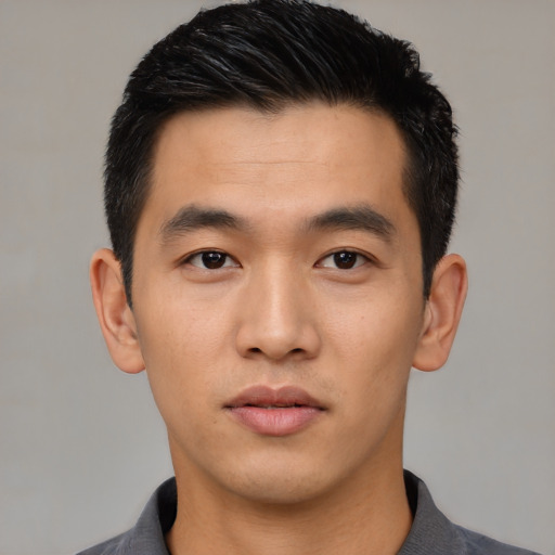 Neutral asian young-adult male with short  black hair and brown eyes