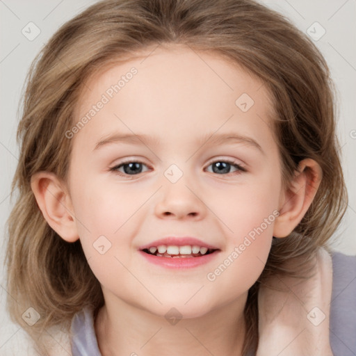 Joyful white child female with medium  brown hair and blue eyes