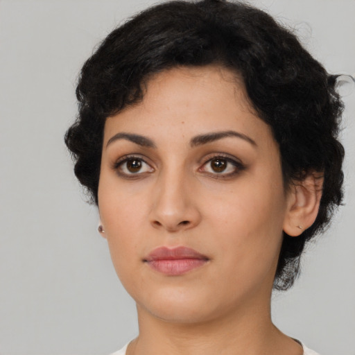 Neutral latino young-adult female with short  black hair and brown eyes