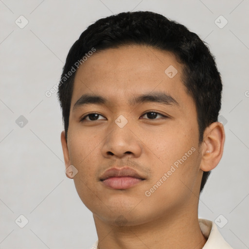 Neutral asian young-adult male with short  black hair and brown eyes