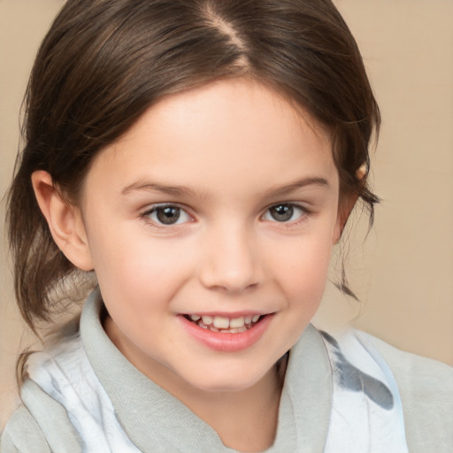 Joyful white child female with medium  brown hair and brown eyes