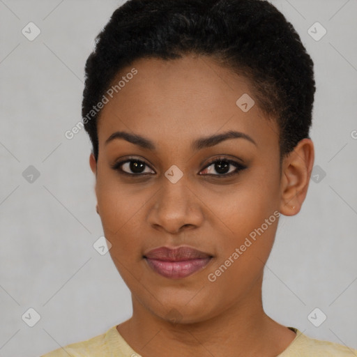 Joyful black young-adult female with short  black hair and brown eyes