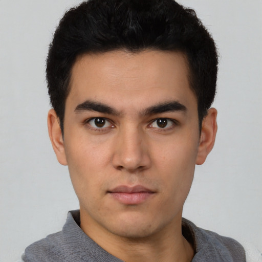 Neutral white young-adult male with short  black hair and brown eyes