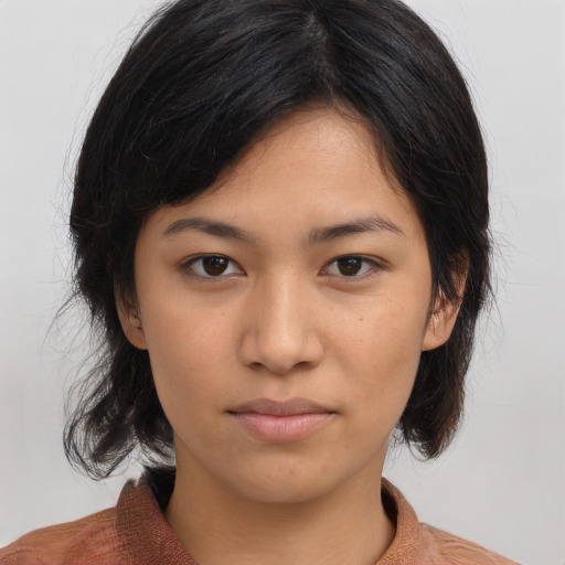 Neutral asian young-adult female with medium  brown hair and brown eyes