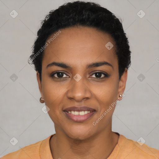 Joyful black young-adult female with short  black hair and brown eyes