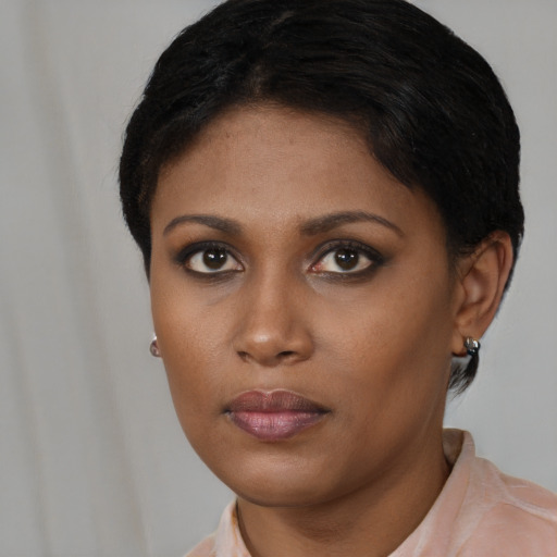 Neutral black young-adult female with short  brown hair and brown eyes