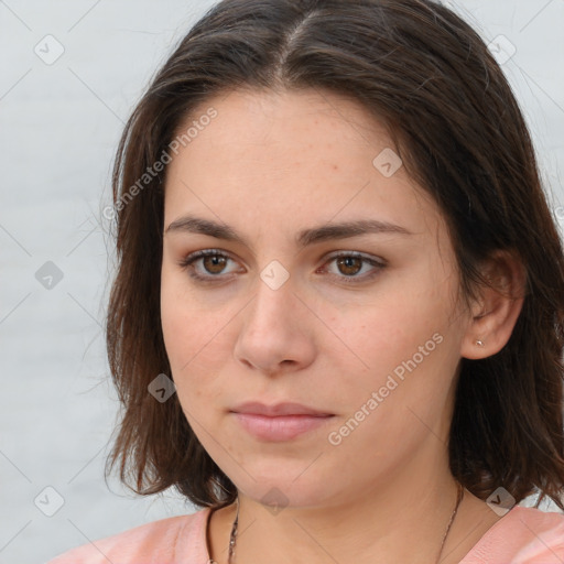 Neutral white young-adult female with medium  brown hair and brown eyes