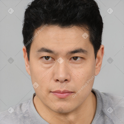 Neutral asian young-adult male with short  brown hair and brown eyes