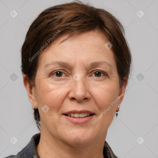 Joyful white adult female with medium  brown hair and grey eyes