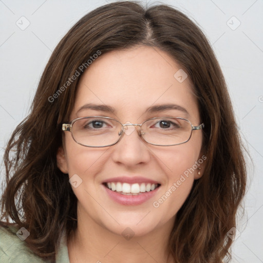 Joyful white young-adult female with long  brown hair and blue eyes