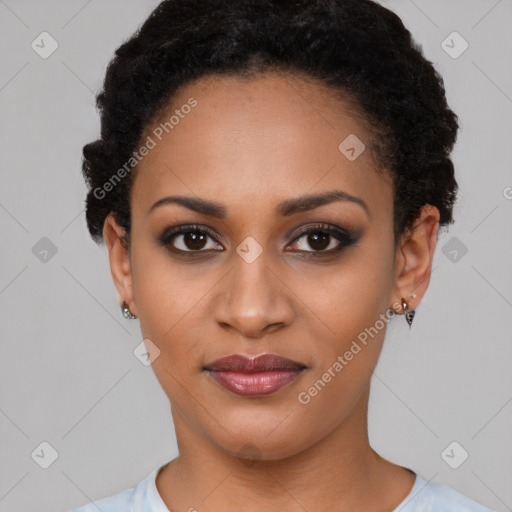 Joyful black young-adult female with short  black hair and brown eyes