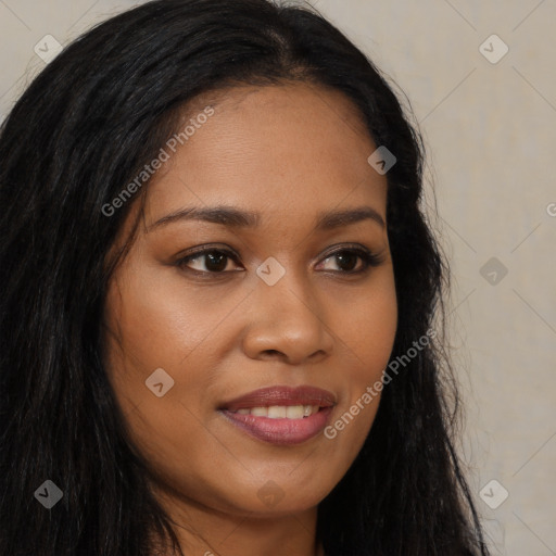 Joyful latino young-adult female with long  brown hair and brown eyes