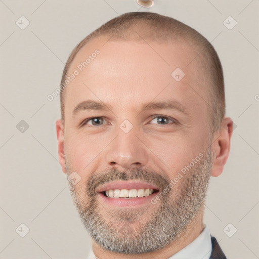 Joyful white adult male with short  brown hair and grey eyes