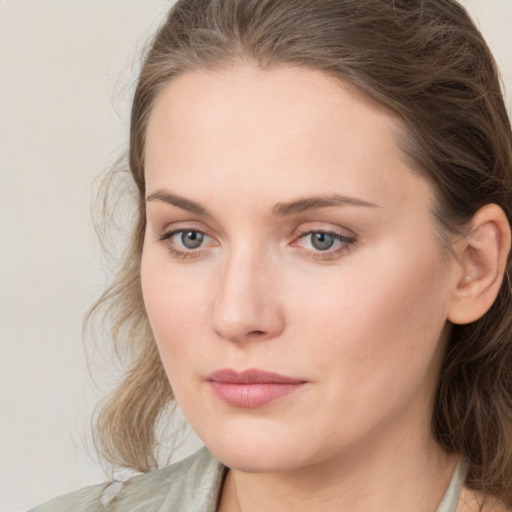 Neutral white young-adult female with medium  brown hair and grey eyes