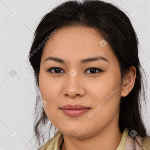 Joyful asian young-adult female with long  brown hair and brown eyes