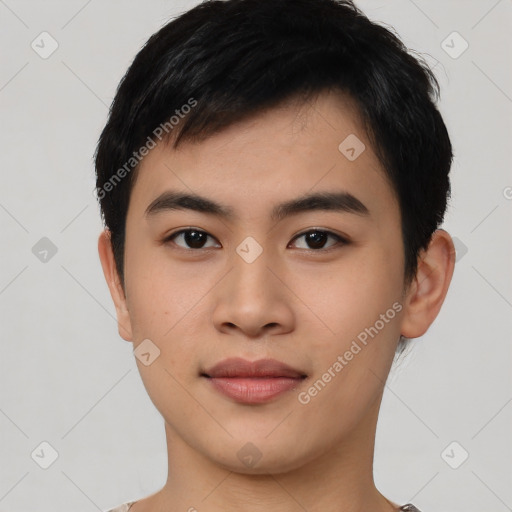 Joyful asian young-adult male with short  black hair and brown eyes