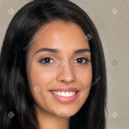 Joyful latino young-adult female with long  brown hair and brown eyes