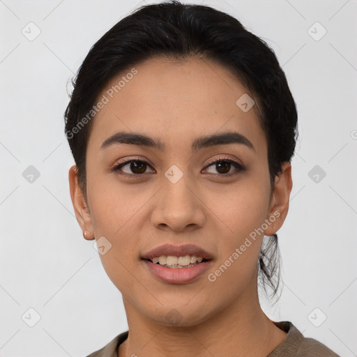 Joyful asian young-adult female with short  black hair and brown eyes