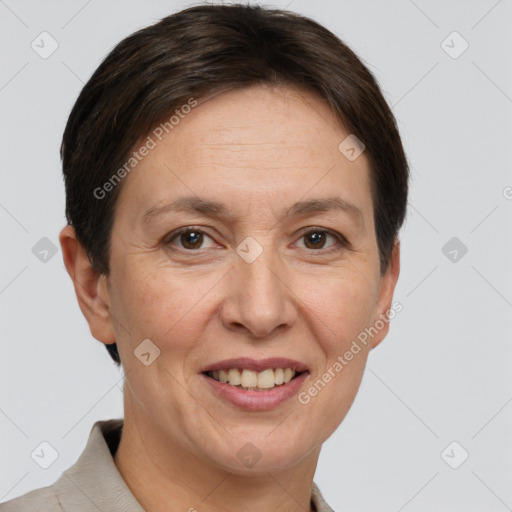 Joyful white adult female with short  brown hair and brown eyes