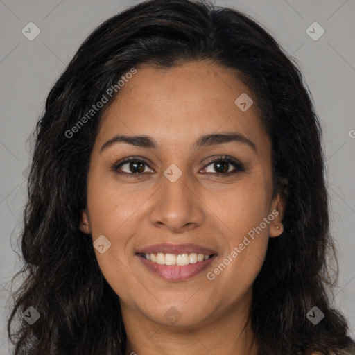 Joyful latino young-adult female with long  brown hair and brown eyes