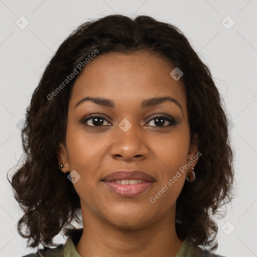 Joyful black young-adult female with medium  brown hair and brown eyes