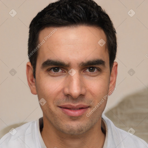 Joyful white young-adult male with short  black hair and brown eyes