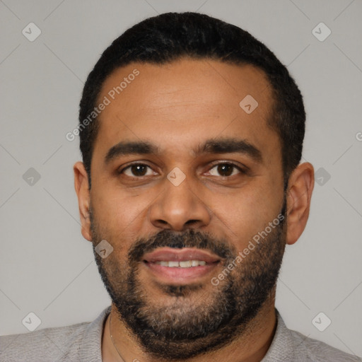 Joyful latino young-adult male with short  black hair and brown eyes