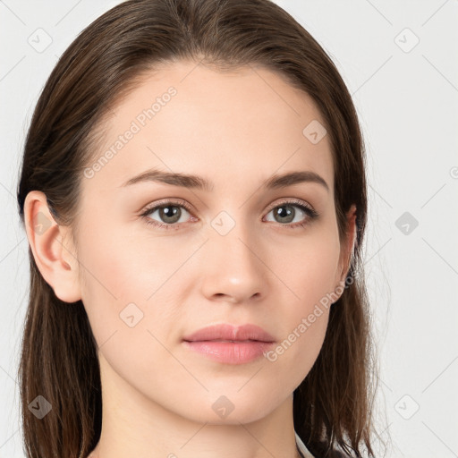 Neutral white young-adult female with long  brown hair and brown eyes