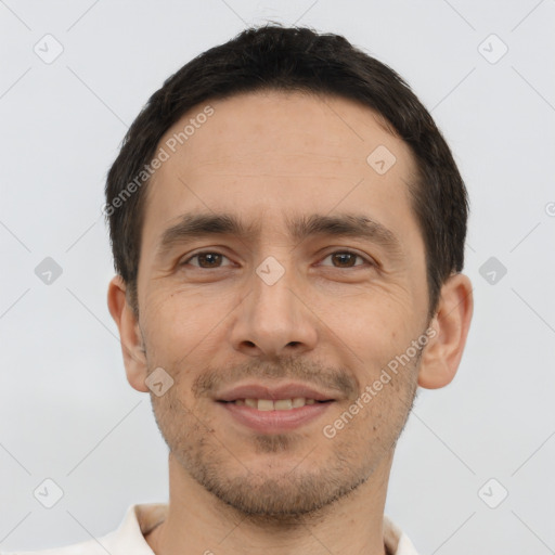 Joyful white young-adult male with short  brown hair and brown eyes