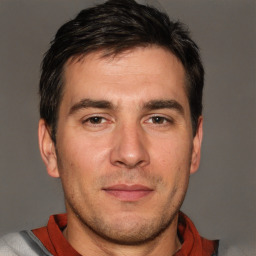 Neutral white adult male with short  brown hair and brown eyes