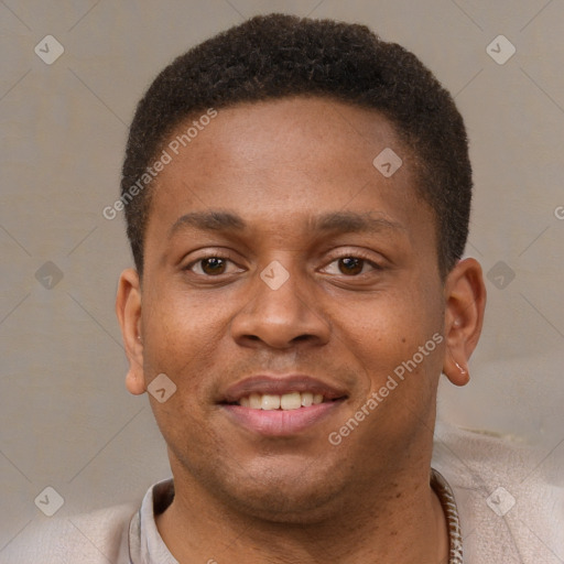 Joyful black young-adult male with short  brown hair and brown eyes