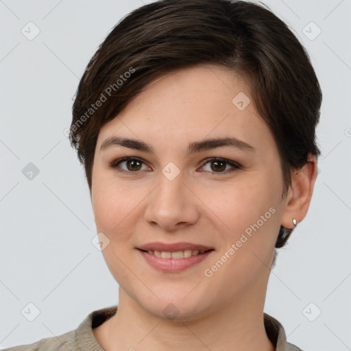 Joyful white young-adult female with medium  brown hair and brown eyes