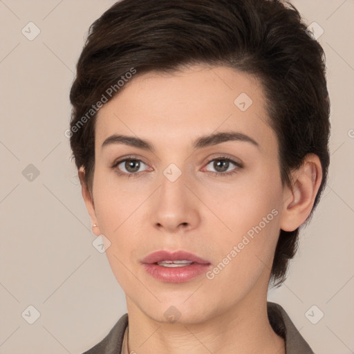 Neutral white young-adult female with short  brown hair and brown eyes