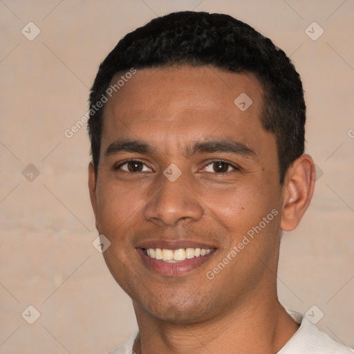 Joyful white young-adult male with short  black hair and brown eyes