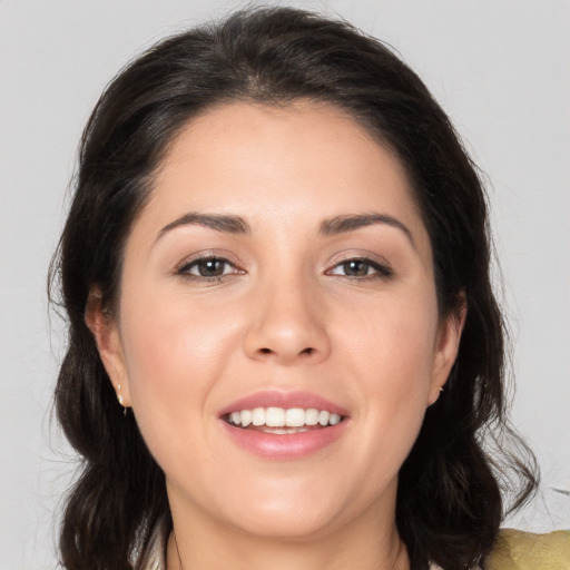 Joyful white young-adult female with medium  brown hair and brown eyes