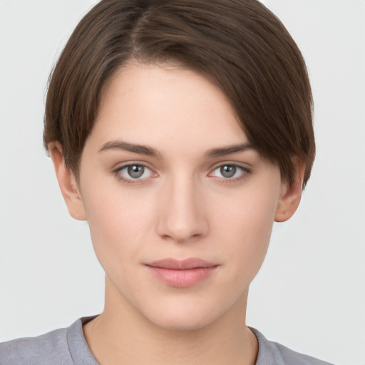 Neutral white young-adult female with short  brown hair and brown eyes