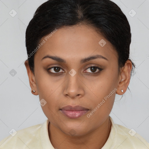 Joyful latino young-adult female with short  brown hair and brown eyes