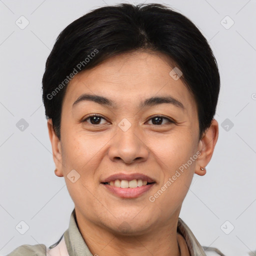 Joyful asian young-adult female with short  brown hair and brown eyes