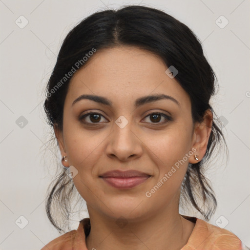 Joyful latino young-adult female with medium  brown hair and brown eyes