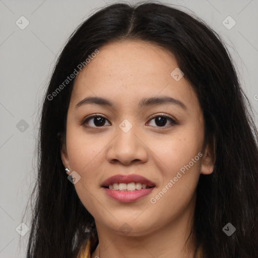 Joyful asian young-adult female with long  brown hair and brown eyes