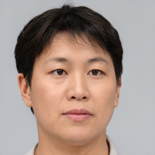 Neutral asian young-adult female with short  brown hair and brown eyes