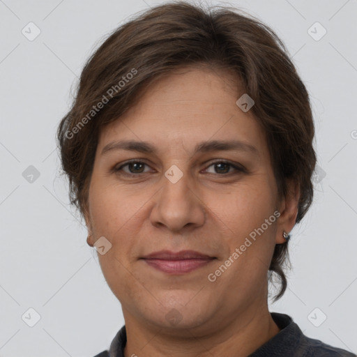 Joyful white adult female with short  brown hair and brown eyes