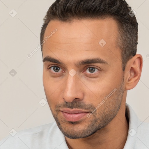 Neutral white young-adult male with short  brown hair and brown eyes